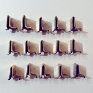 Set of 15 Brass Shelving Brackets.